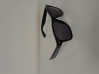 Black Sunglasses marked &quot;Tito&#039;s&quot;